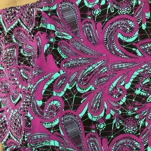 Pink, mint green,& black Lularoe tc leggings